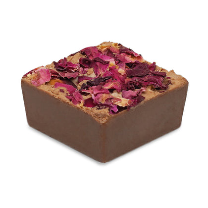 Milk chocolate square topped with dried rose petals