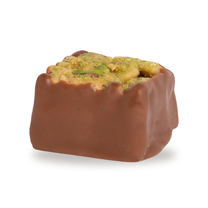A whole Madlouka — a milk chocolate round with nuts