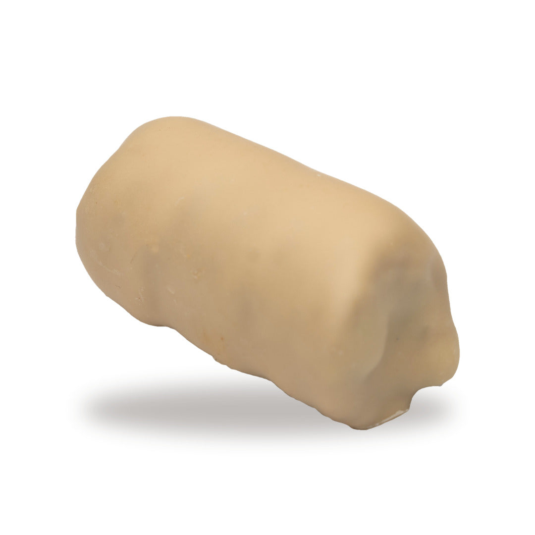 A whole Pistachio Biscuit Roll — a chocolate roll with cream