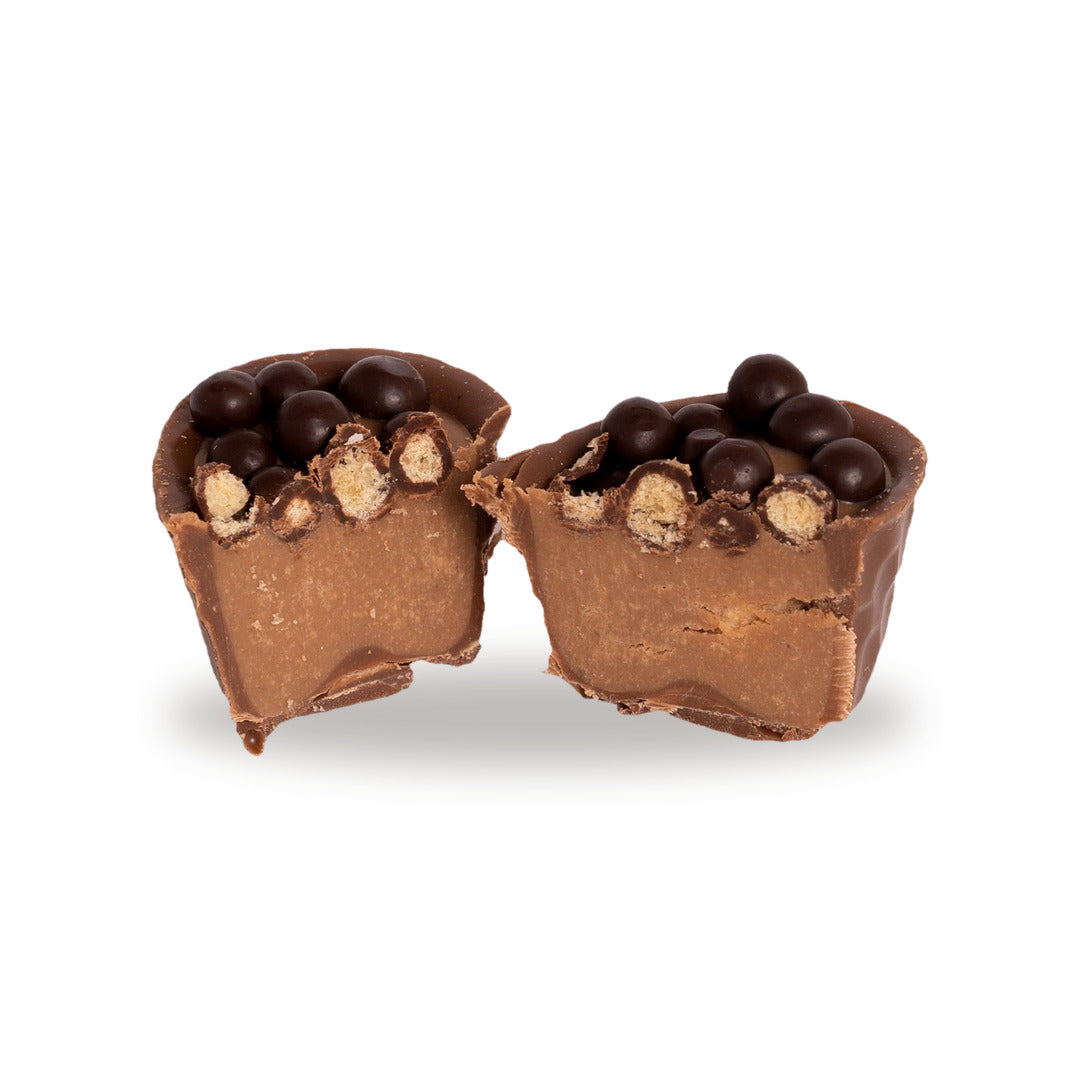 A chocolate Crisped Rice Toffee broken open, showing the milk &amp; dark chocolate inside