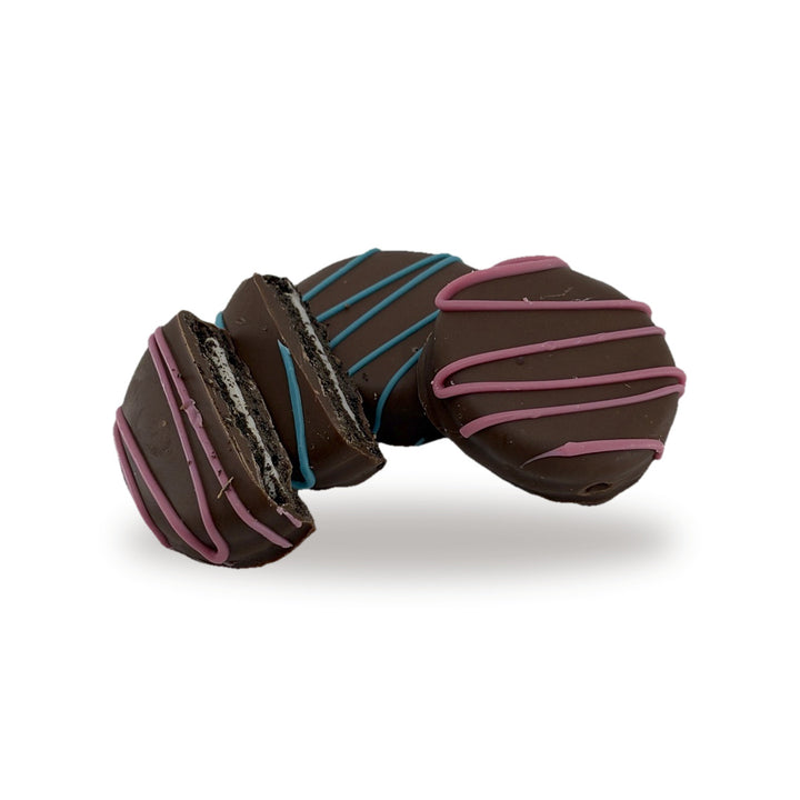 Cocoa Cookie Pink and Cocoa Cookie Blue together, whole and cut open, for a mixed pink and blue order