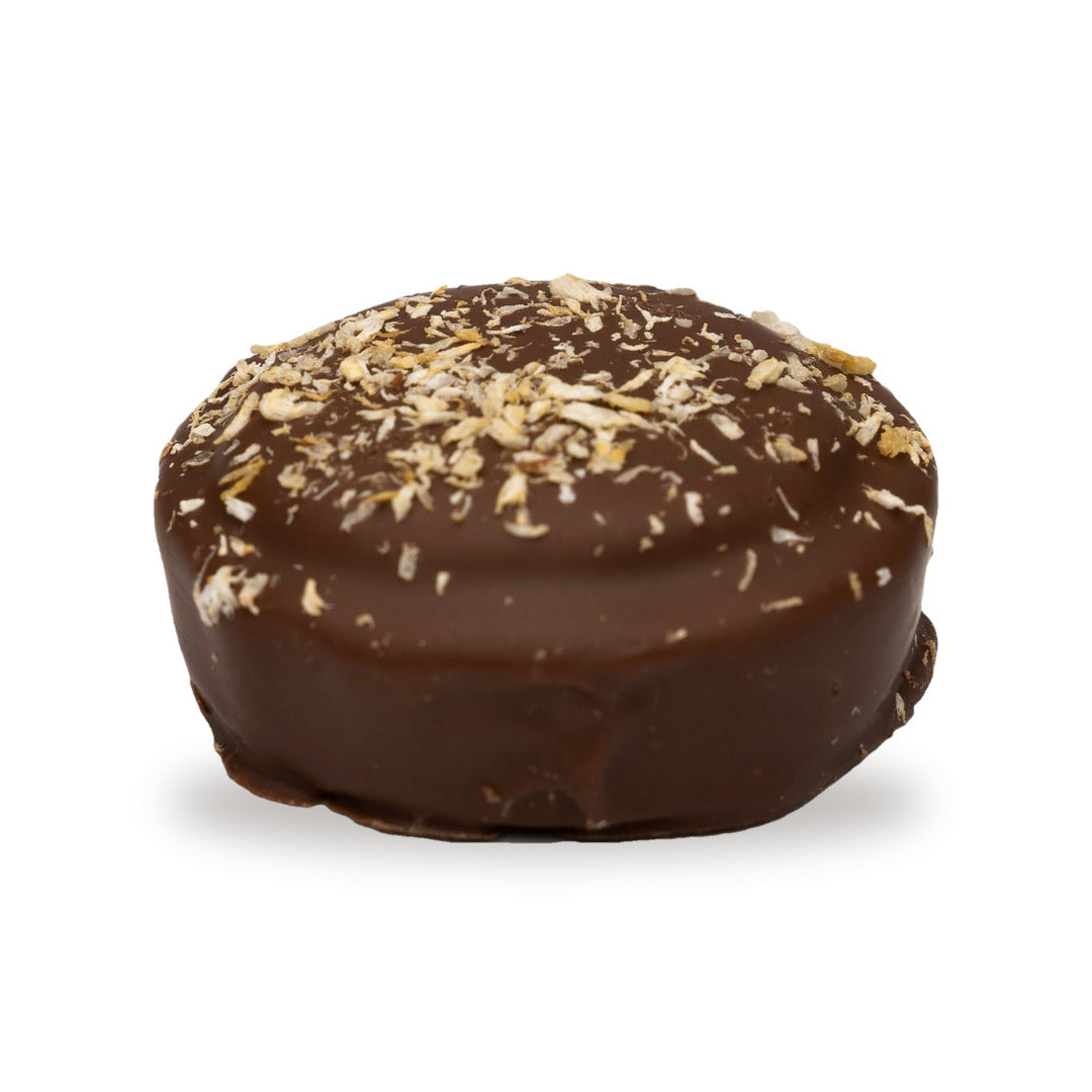 A whole Double Coconut Cookie — a milk chocolate round