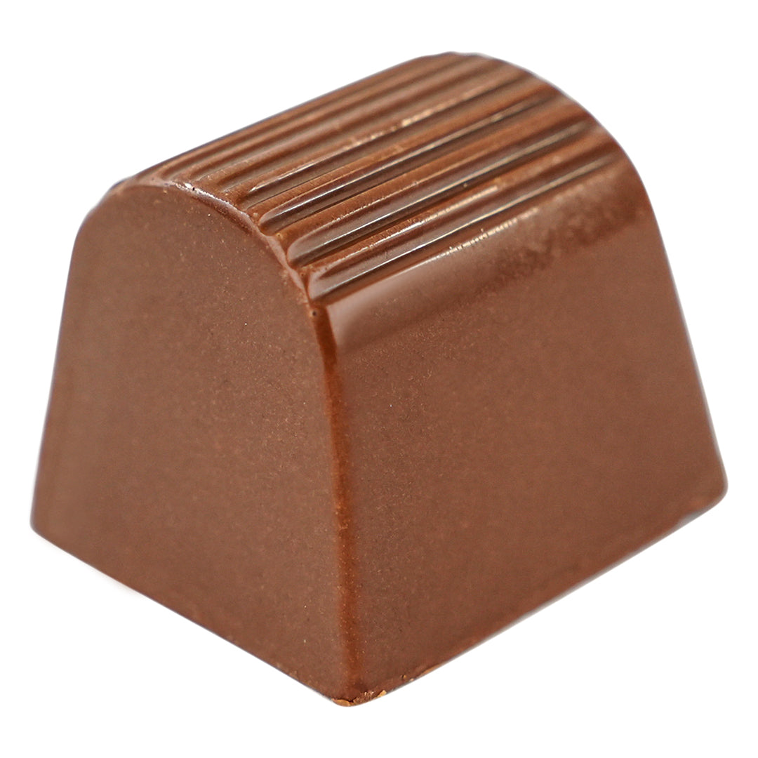 Milk chocolate square with a smooth domed top and lined texture.
