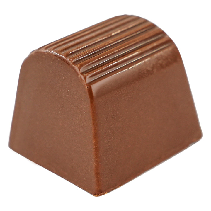 Milk chocolate square with a smooth domed top and lined texture.