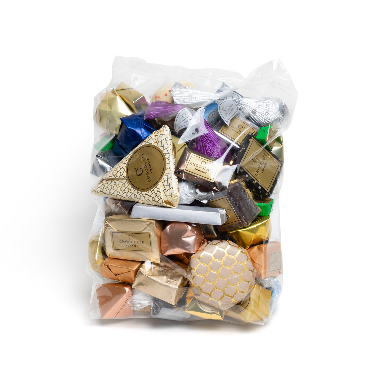 Mixed chocolates with foil wrappers and decorative bows in a bulk order presentation