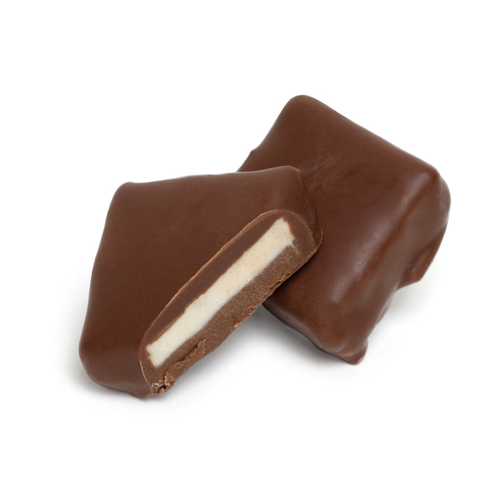 Cross-section showing biscuit center in chocolate shell with coffee-cardamom flavor