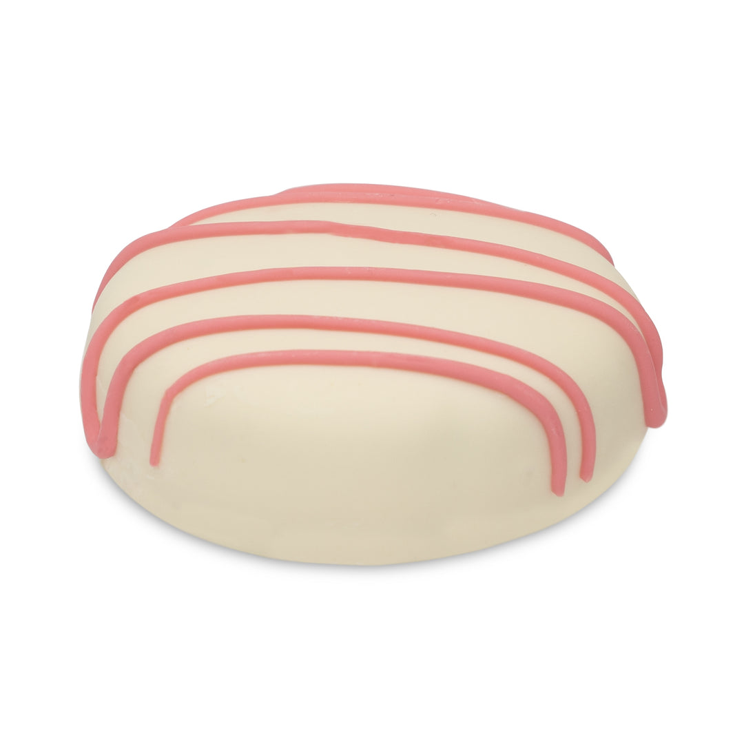 Cocoa cookie with pink drizzle