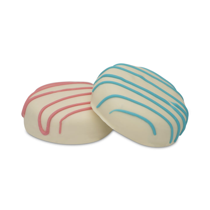 Cocoa cookie treats coated in white chocolate with pink and blue drizzle