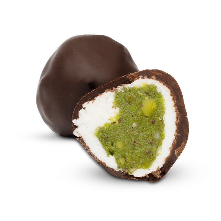 Cross-section showing green pistachio center and coconut layer