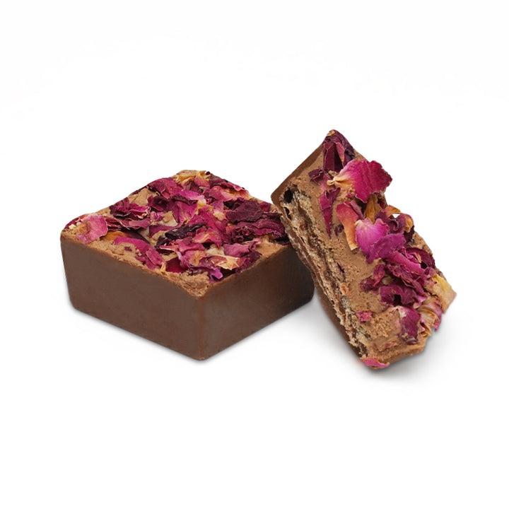 Inside view of chocolate biscuit with rose topping
